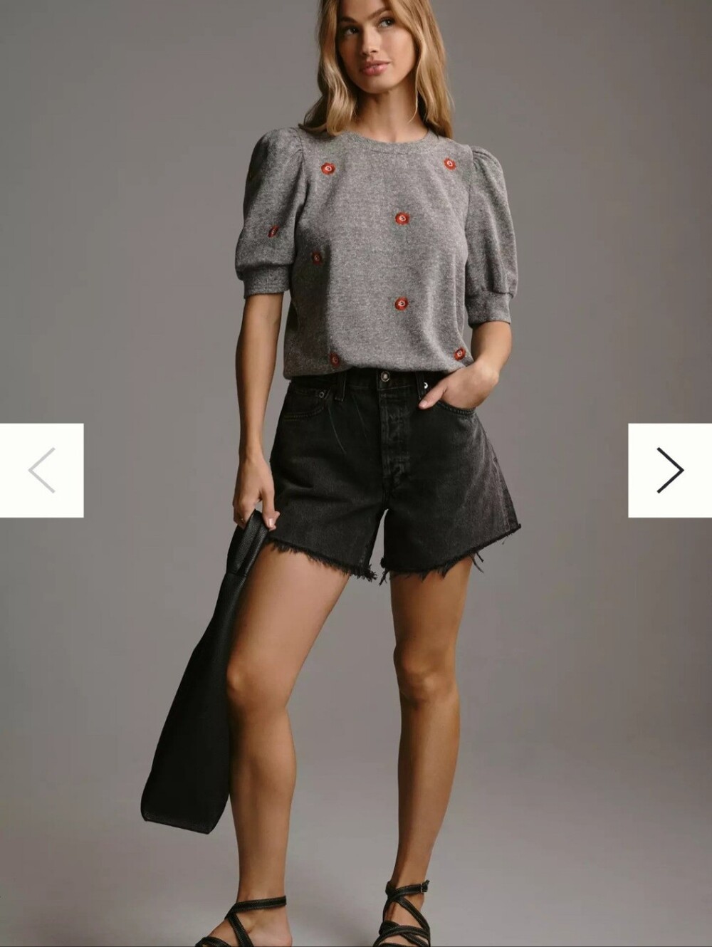 Gray Anthropologie T.La puff-sleeved pullover featuring embroidered flowers.
